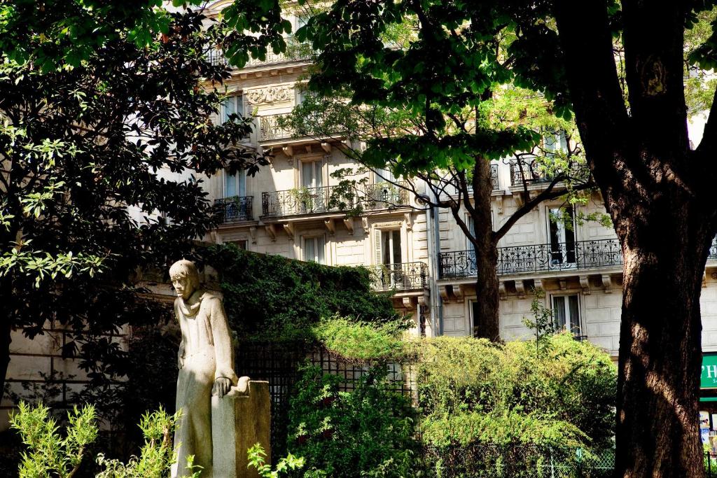 Zona verde exterior do Residence Henri IV